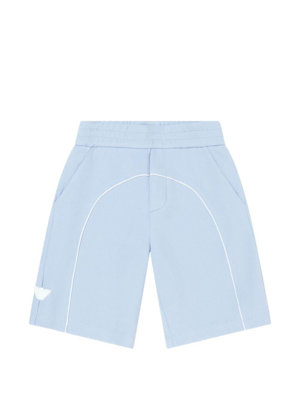 Shorts per bambino Emporio Armani Kids azzurri con logo aquila sul davanti - Rubino Kids