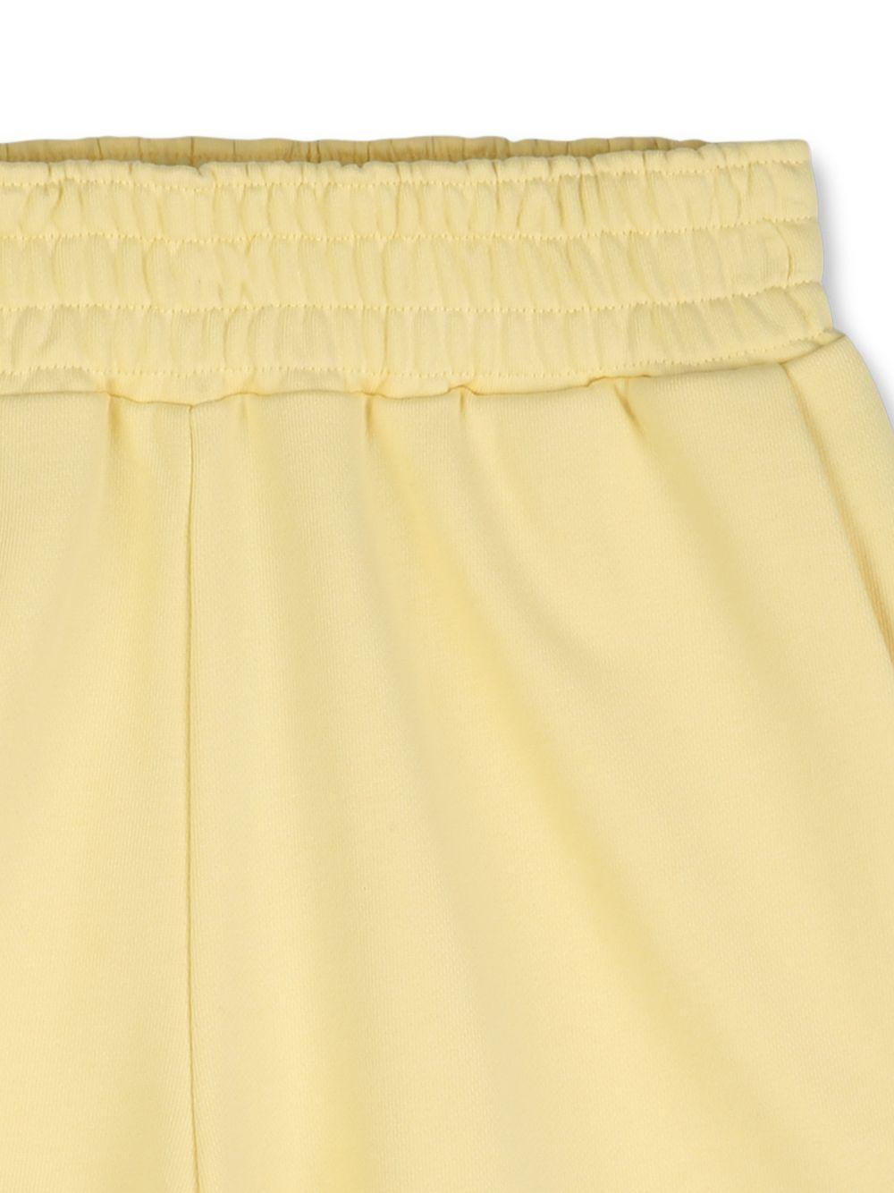 Shorts per bambino Givenchy Kids giallo con stampa logo - Rubino Kids