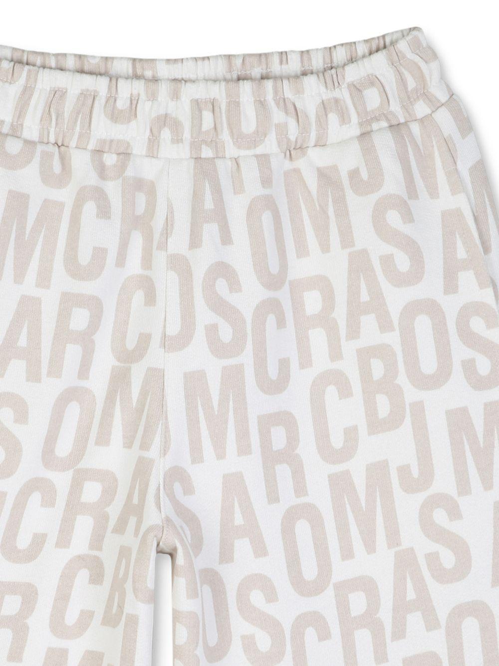 Shorts per bambino The Marc Jacobs Kids con stampa beige chiaro logo all - over - Rubino Kids