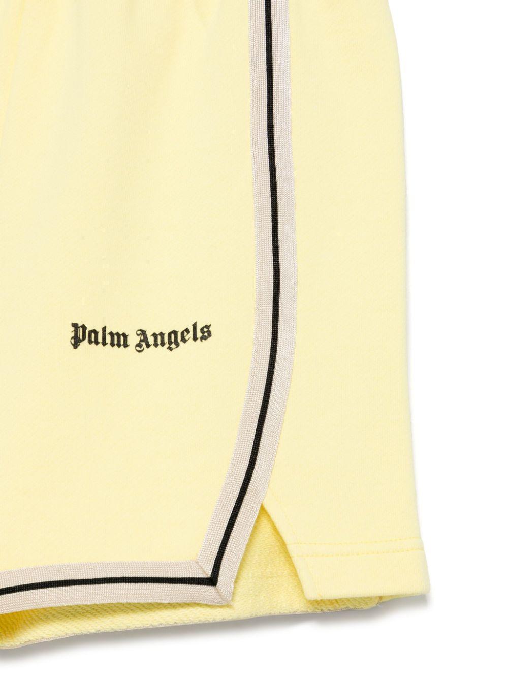 Shorts sportivi con stampa per bambino Palm Angels Kids giallo con spacchetti laterali - Rubino Kids