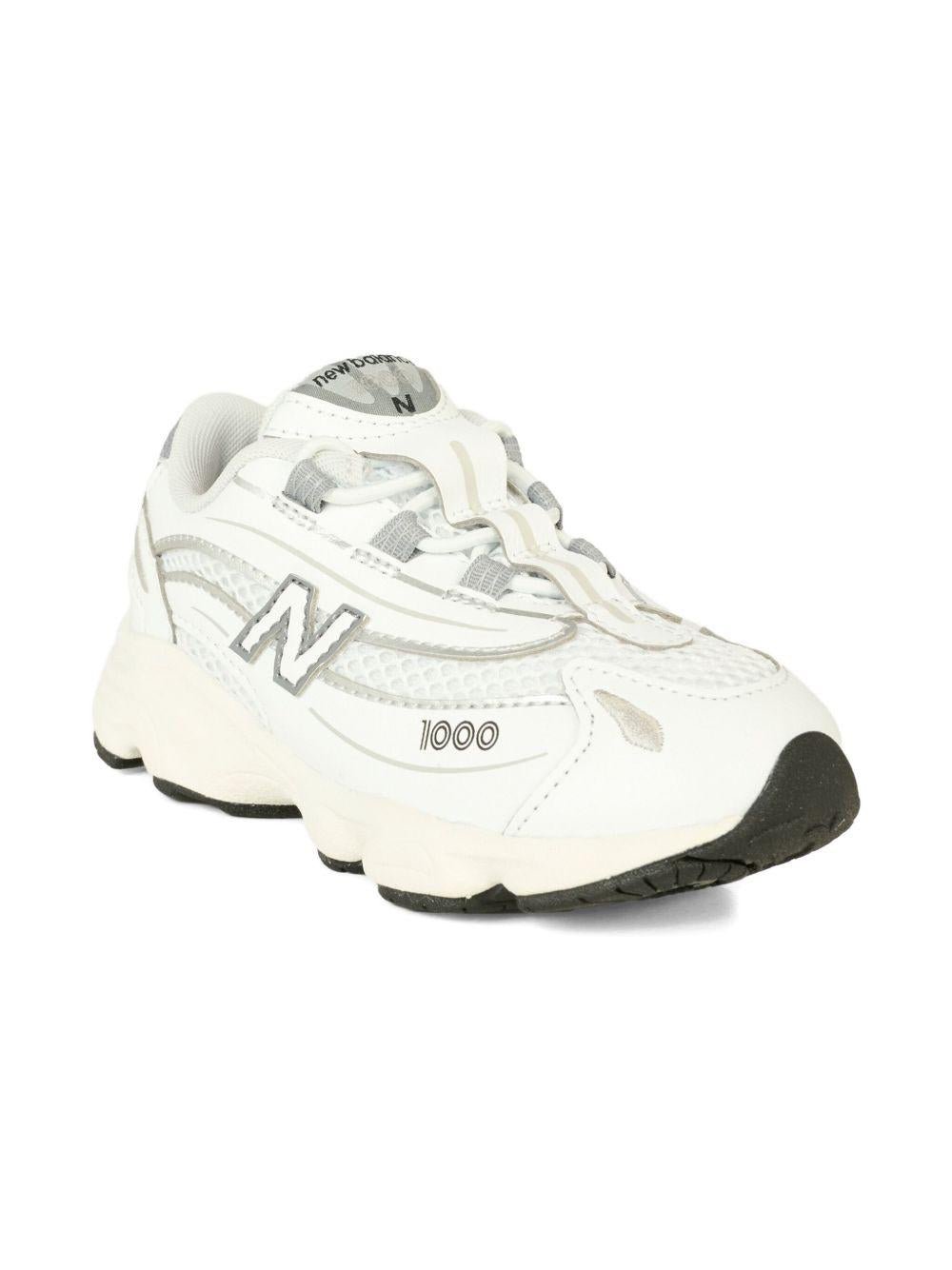 Sneakers 1000 per bambini New Balance Kids bianche con dettaglio logo - Rubino Kids