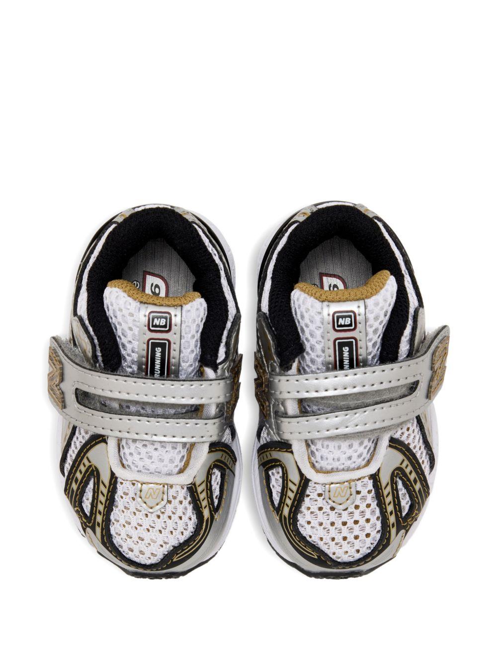 Sneakers 1906 per bambino New Balance Kids grigie con inserti a contrasto - Rubino Kids