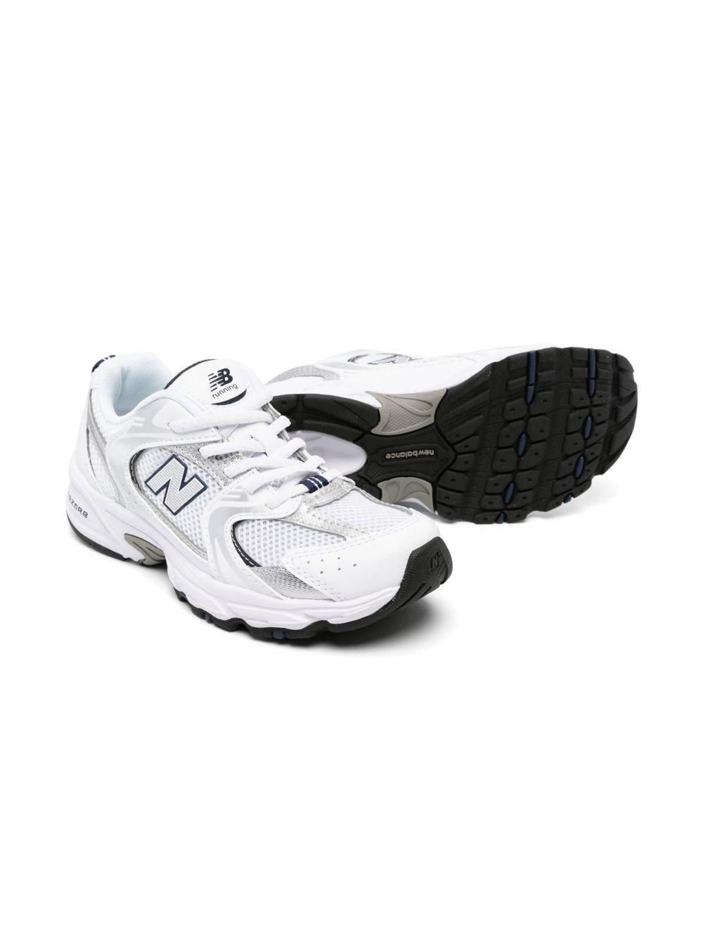 Sneakers 530 per bambini New Balance Kids bianche con design a inserti grigi - Rubino Kids