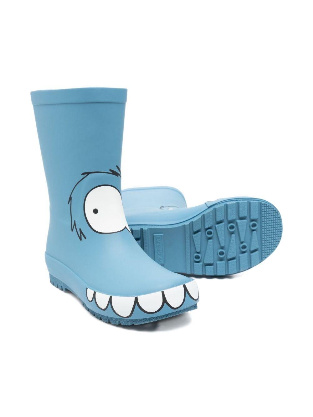 Stivali da pioggia per bambino Stella McCartney Kids azzurro con texture a forma di faccia di mostro - Rubino Kids