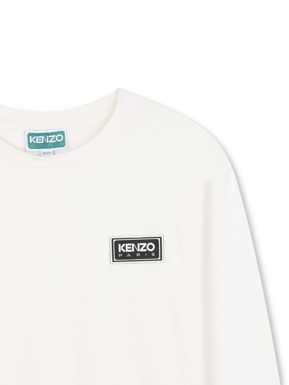 T-shirt per bambini Kenzo Kids bianca con dettaglio con stampa logo - Rubino Kids