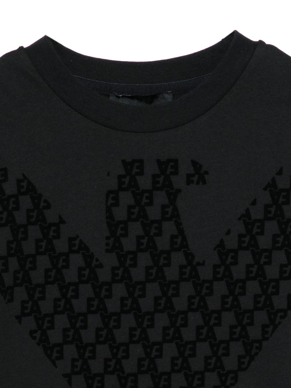 T-shirt per bambino Emporio Armani Kids nera con logo dell'aquila - Rubino Kids