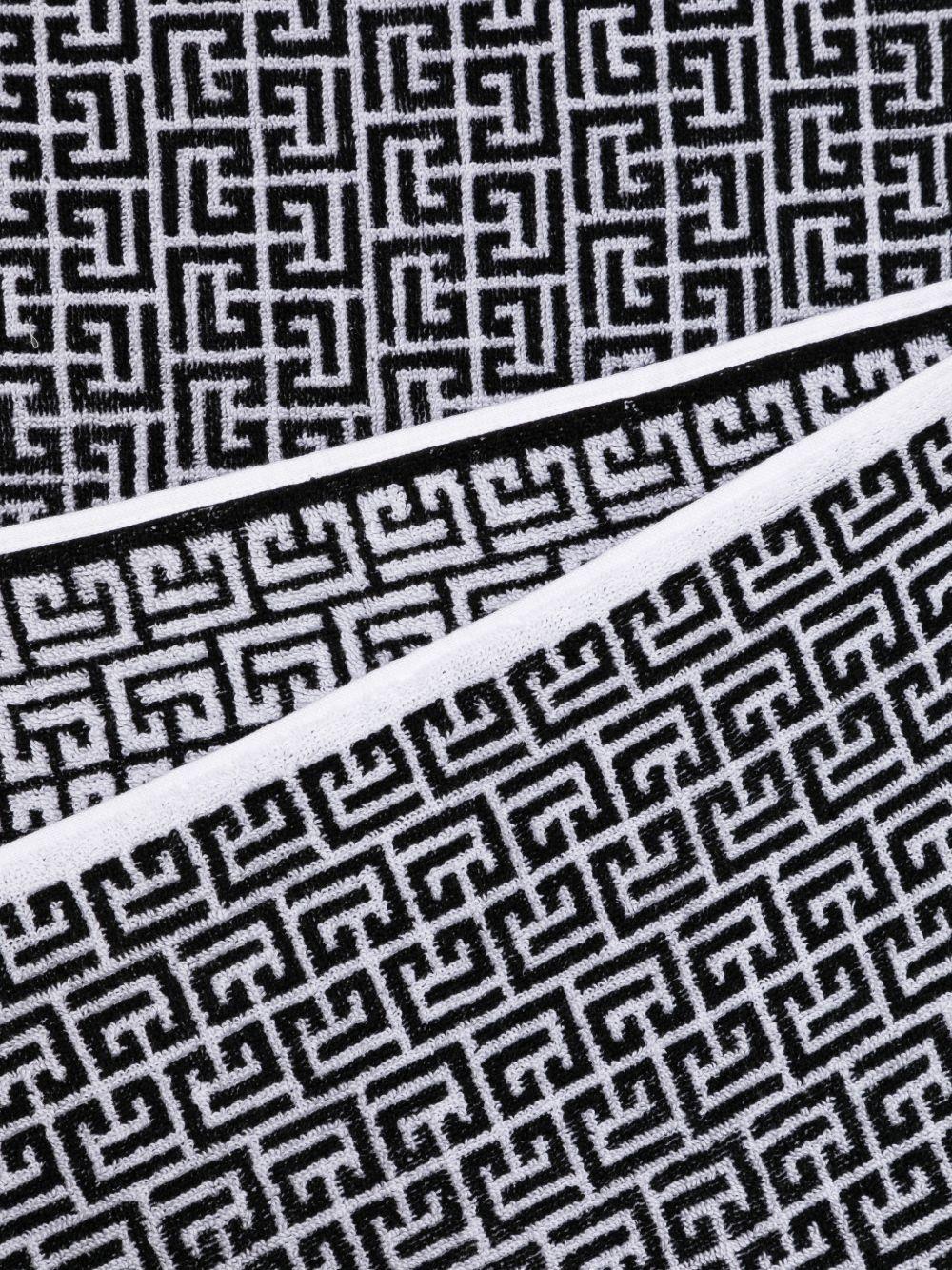 Telo mare per bambini Balmain Kids bianco e nero con stampa geometrica all - over - Rubino Kids