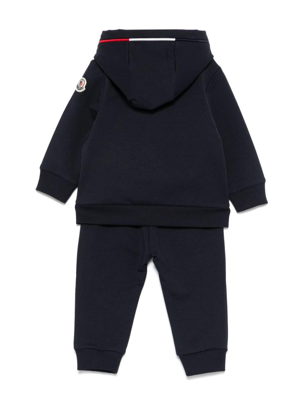 Tuta sportiva per neonato Moncler Enfant blu con chiusura frontale con zip - Rubino Kids