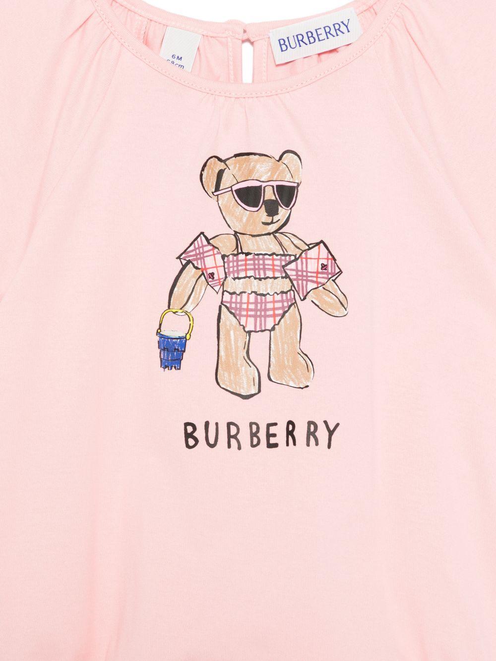 Tutina per neonata Burberry Kids rosa con stampa orsetto in costume sul davanti - Rubino Kids