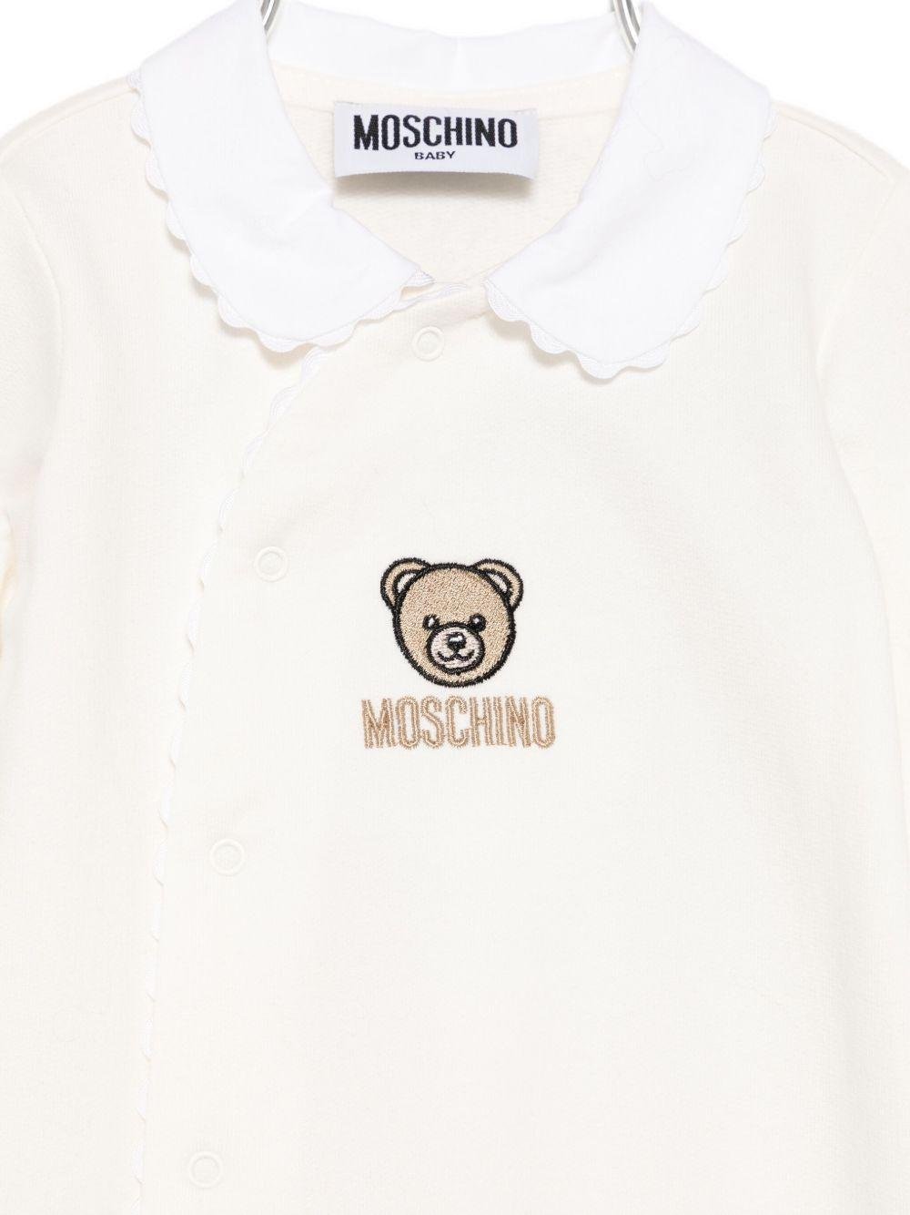 Tutina per neonata Moschino Kids bianco con ricamo Teddy - Rubino Kids