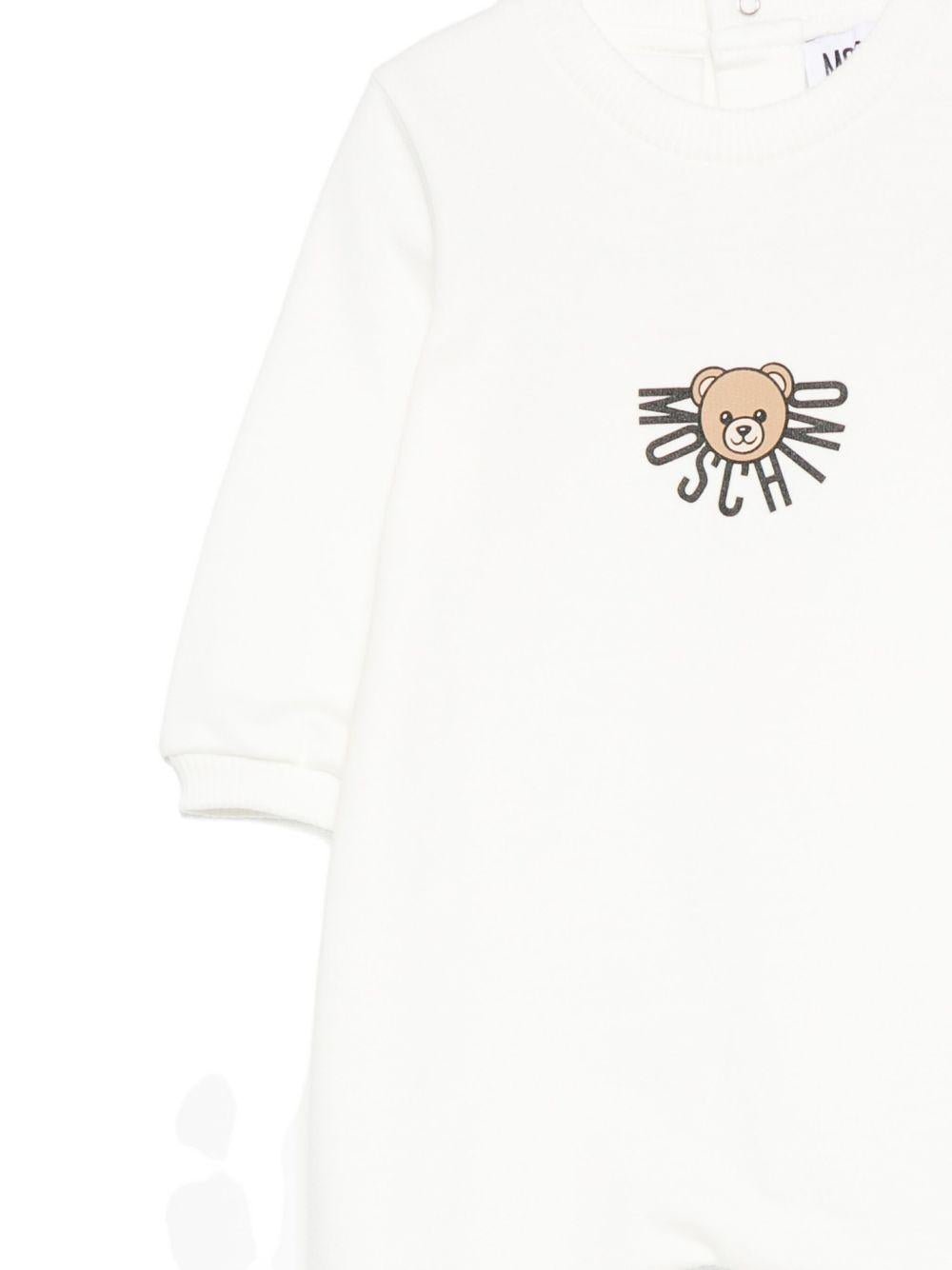 Tutina per neonati Moschino Kids bianco in cotone con stampa teddy - Rubino Kids