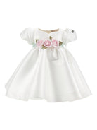 Abito per neonata Monnalisa bianco con dettaglio con fiocco e con fiore - Rubino Kids