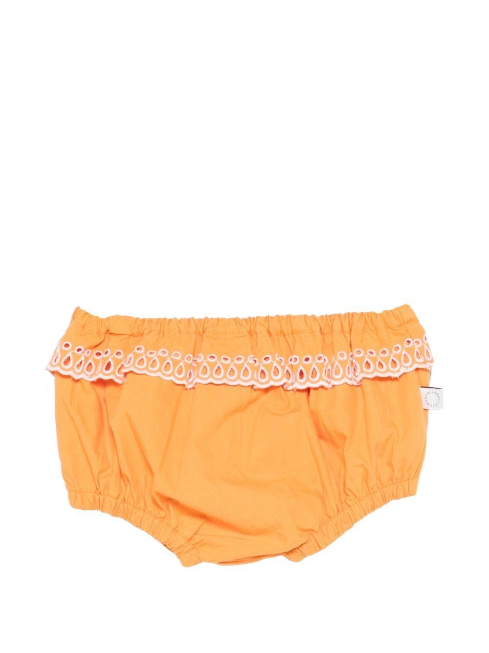 Abito per neonata Stella McCartney Kids arancione in pizzo sangallo - Rubino Kids