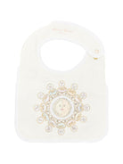 Bavaglino per neonati Atelier Choux giallo con stampa zodiacale - Rubino Kids