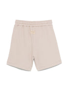Bermuda con logo per bambino MSGM Kids beige con due tasche laterali - Rubino Kids