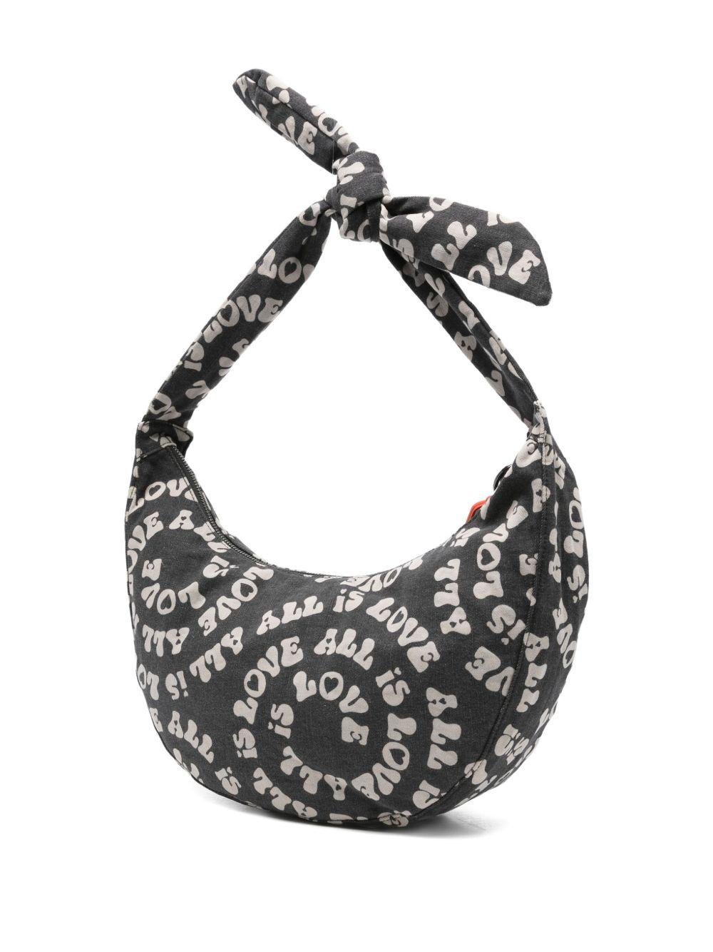 Borsa a mezzaluna per bambina Stella McCartney Kids nera con ciondolo a forma di labbra - Rubino Kids