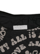 Borsa a mezzaluna per bambina Stella McCartney Kids nera con ciondolo a forma di labbra - Rubino Kids