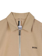 Camicia per bambino Boss Kids beige a maniche corte con zip - Rubino Kids