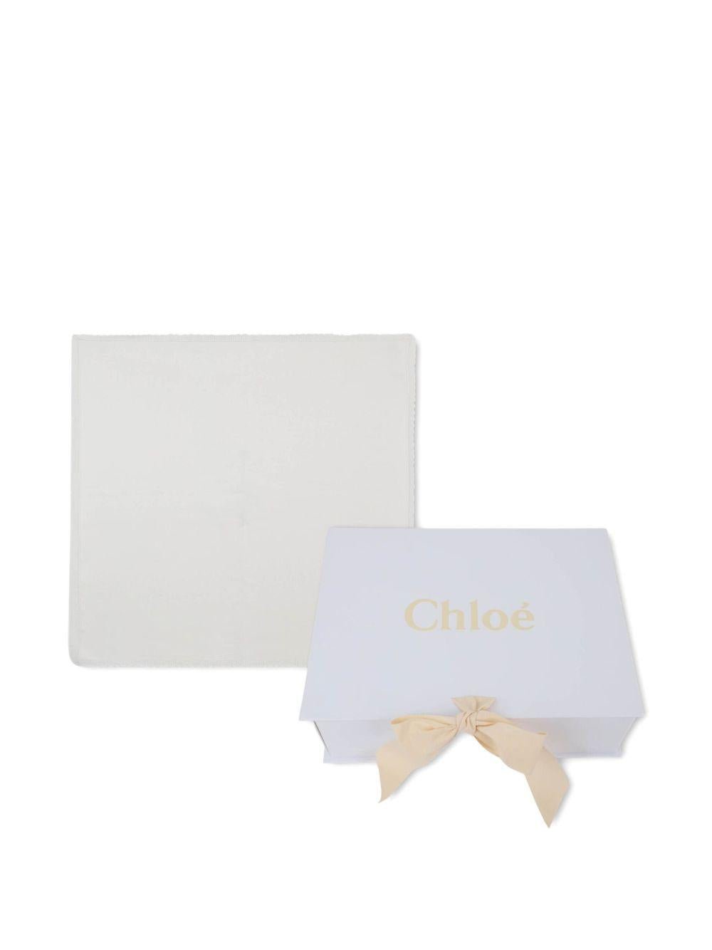 Coperta per neonata Chloé Kids bianca con ricamo a fiori - Rubino Kids