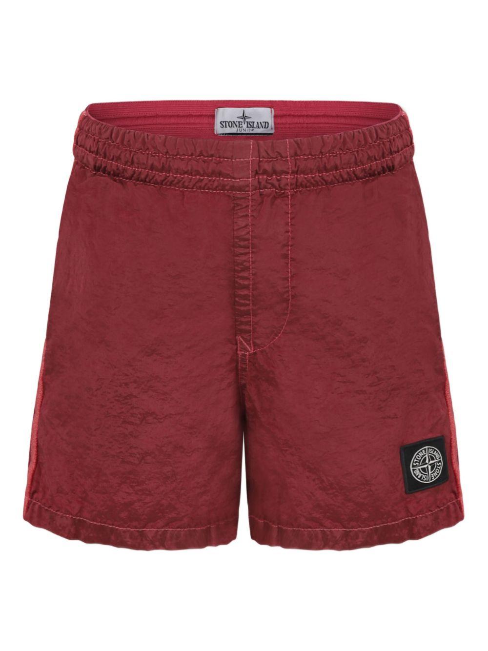 Costume da bagno per bambino Stone Island Junior rosso con applicazione logo sulla gamba - Rubino Kids