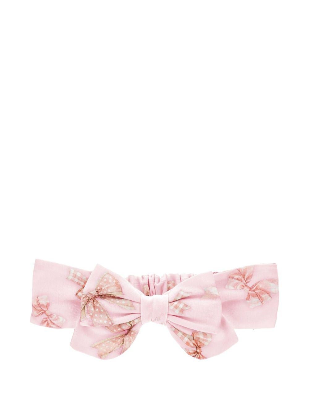 Fascia per capelli per neonata Monnalisa rosa con stampa grafica e dettaglio fiocco - Rubino Kids