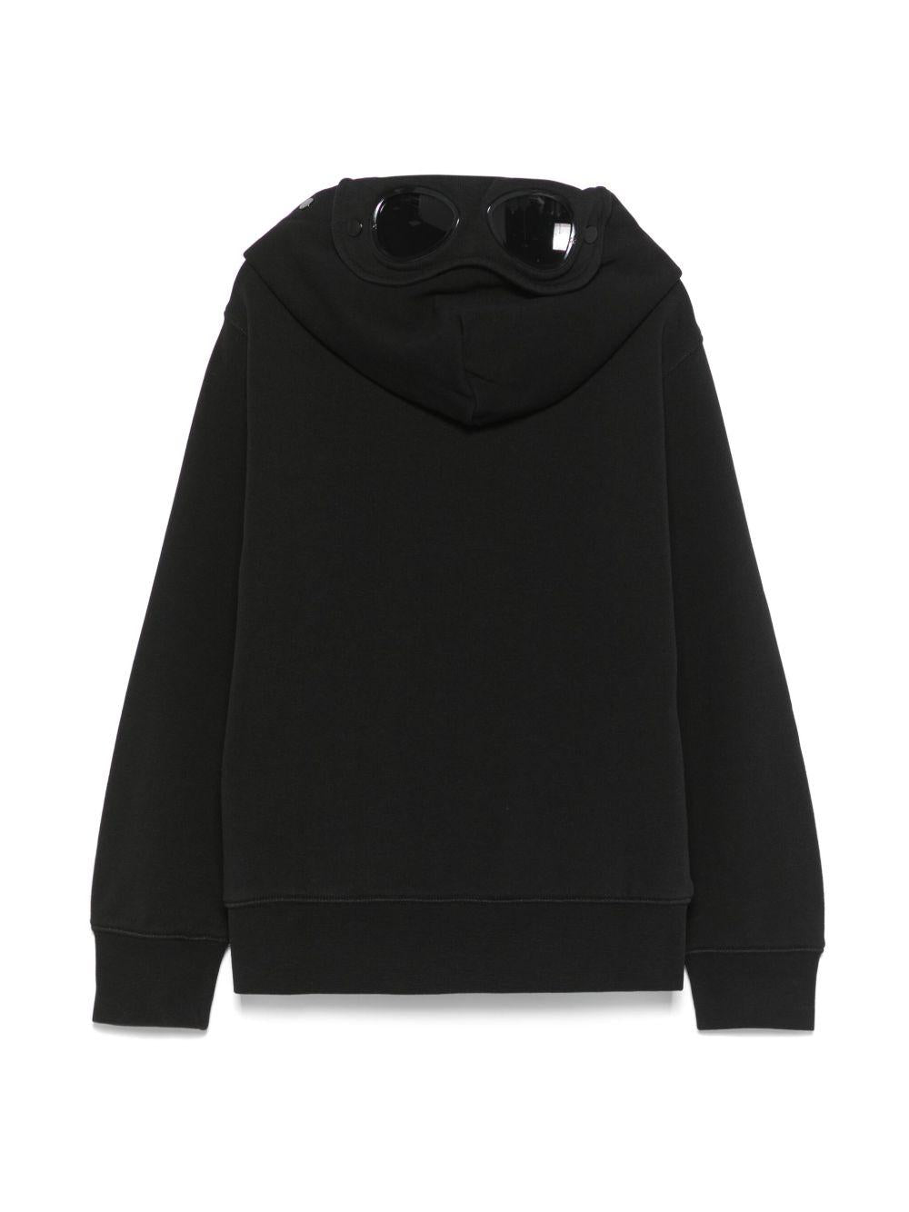 Felpa con occhialini sul cappuccio per bambino C.P. Company Kids nero con tasche frontali - Rubino Kids