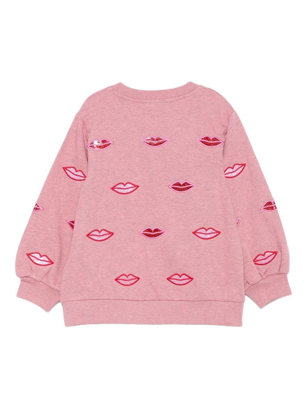 Felpa per bambina Stella McCartney Kids rosa con labbra decorate - Rubino Kids