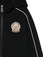 Felpa per bambino Moschino Kids nero con cappuccio e zip con logo teddy - Rubino Kids