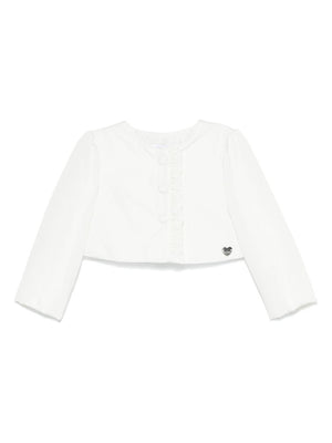 Monnalisa white biker jacket for newborns with ruffled detail