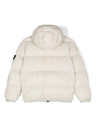 Giacca imbottita con distintivo della bussola per bambino Stone Island Junior beige con cappuccio classico - Rubino Kids