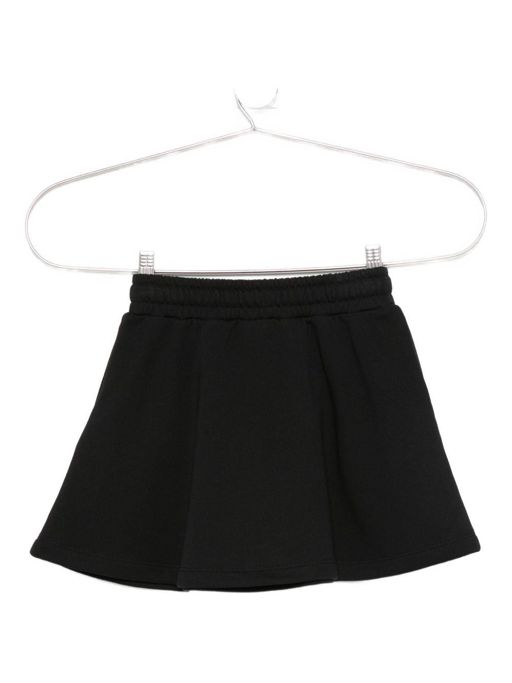 Gonna plissettata per bambina Moschino Kids nera con dettaglio logo - Rubino Kids