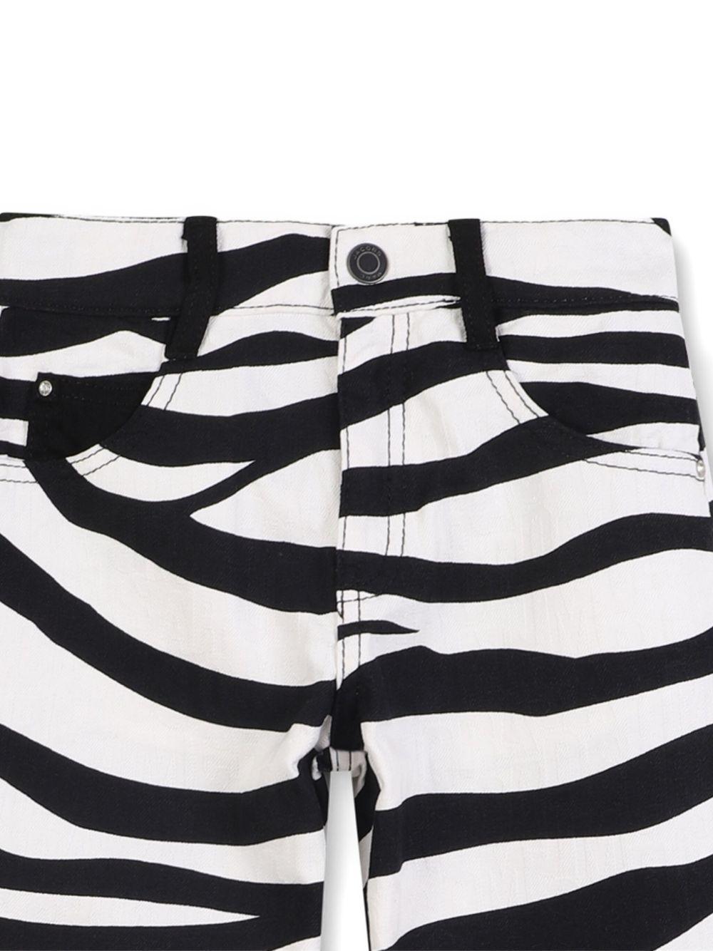 Pantaloni zebrati per bambina Marc Jacobs Kids animalier con stampa zebrata all-over W60591 09B THE MARC JACOBS KIDS 