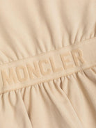 Abito modello felpa per bambina Moncler Enfant beige con logo K19548I0000589AKM 51N MONCLER ENFANT 