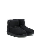 Stivali Classic Mini II per bambina UGG Kids neri con design slip-on 1017715K BLK UGG 