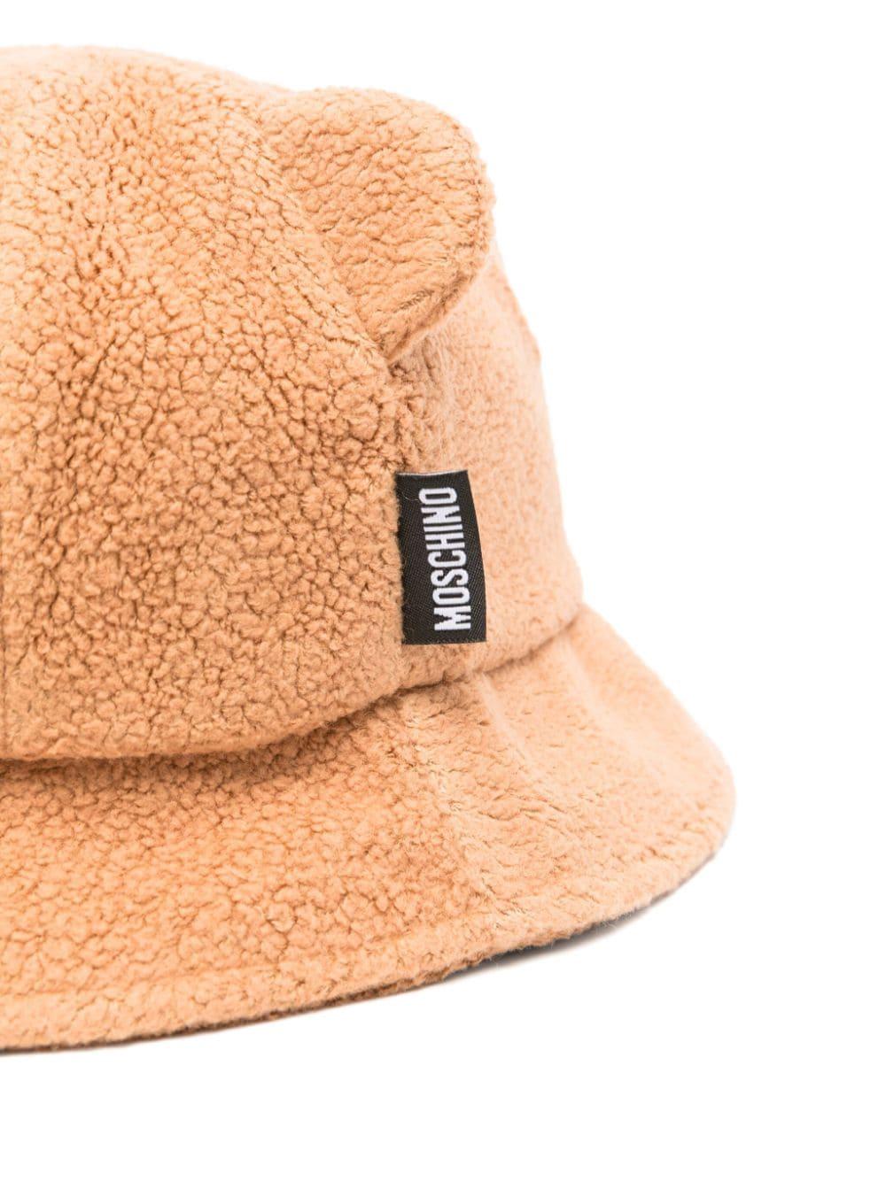 Cappello bucket Leo Teddy per neonato Moschino Kids beige con corona rotonda MUX04OLIA21 20121 MOSCHINO KIDS 