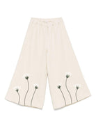 Pantaloni per bambina Donsje beige con applicazione a fiori 4092302 00037 DONSJE 