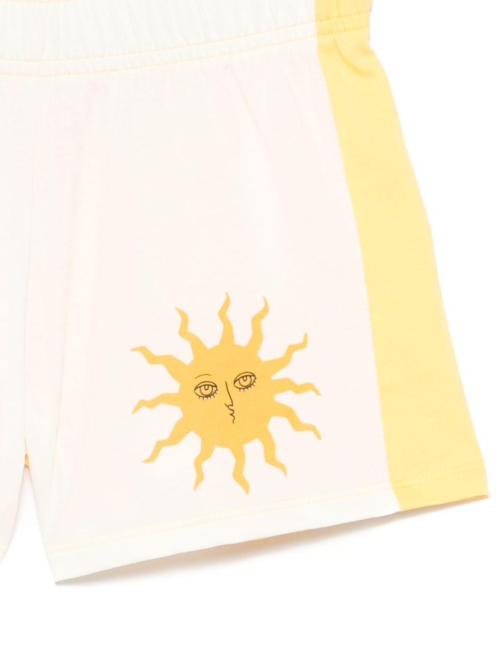 Shorts per bambina Mini Rodini bianco con stampa con sole 2563010911 OFF-WHITE MINI RODINI 