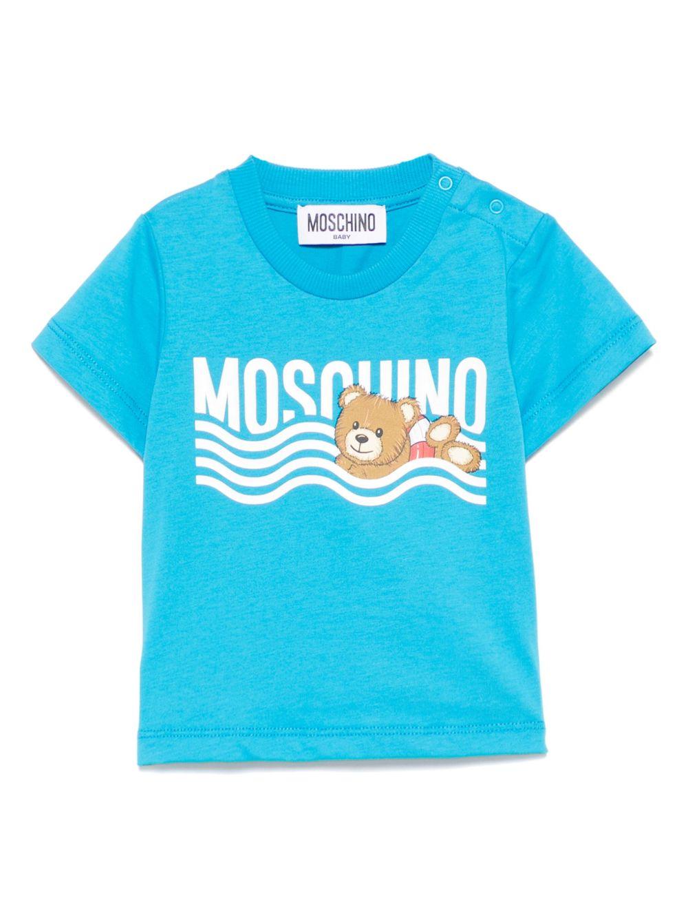 T-shirt per neonato Moschino Kids azzurro con motivo Teddy Bear MUM04DLAA24 41047 MOSCHINO KIDS 