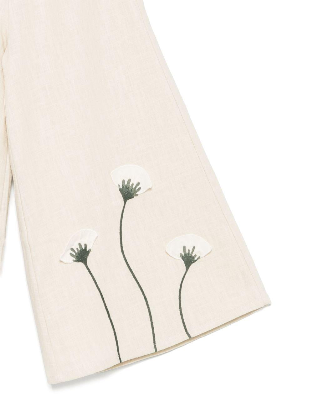 Pantaloni per bambina Donsje beige con applicazione a fiori 4092302 00037 DONSJE 