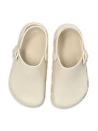 Sandali per bambini Birkenstock Kids Birki Flow beige con cinturino alla caviglia 1029567 EGGSHELL BIRKENSTOCK 