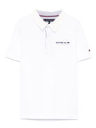 Polo con ricamo per bambino Tommy Hilfiger Junior bianco con spacchi laterali KB0KB09332 YBR TOMMY HILFIGER JUNIOR 