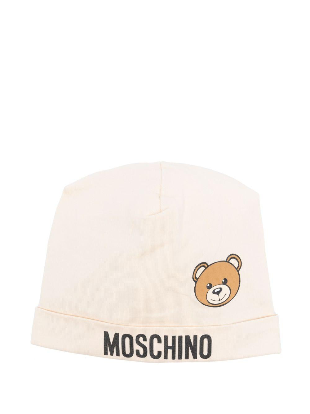 Cappello per neonato Moschino Kids beige con stampa logo e Teddy Bear MUX05ALBA00 20404 MOSCHINO KIDS 