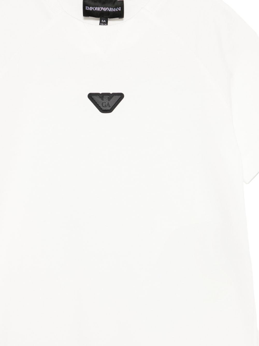 T-shirt per bambino Emporio Armani Kids bianca con logo Aquila sul davanti EB000943 AF13715 U0003 EMPORIO ARMANI KIDS 