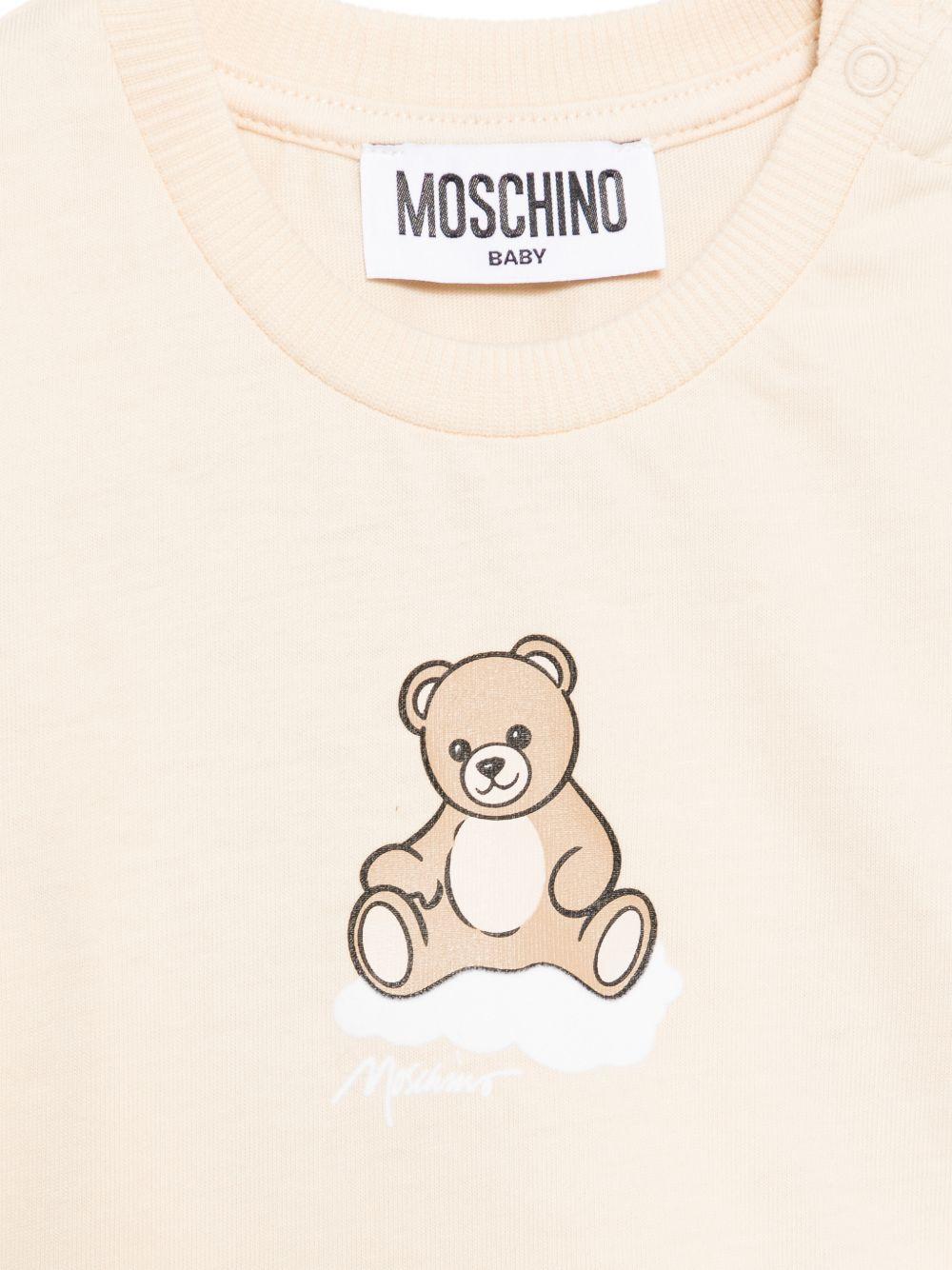 T-shirt per neonati Moschino Kids beige con stampa Teddy sul davanti MUM04QLAA24 20404 MOSCHINO KIDS 