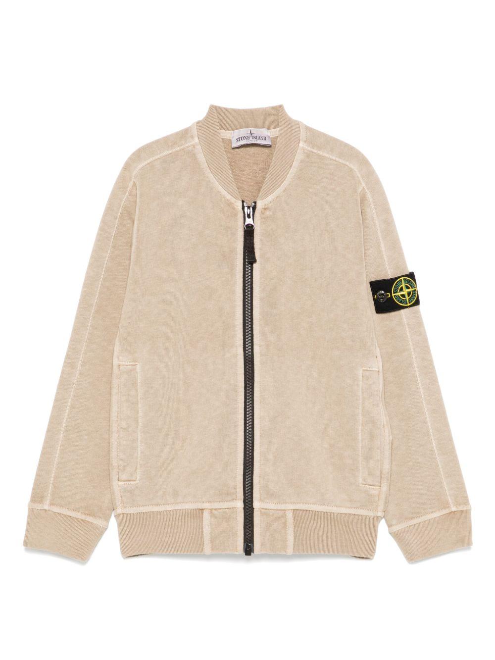 Felpa per bambino Stone Island Junior beige con applicazione Compass K1S166100004S0060 V019A STONE ISLAND JUNIOR 