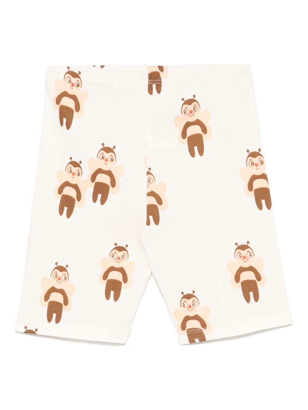 Shorts per bambina Mini Rodini bianco con stampa grafica con lunghezza alla coscia 2563012011 OFF-WHITE MINI RODINI 