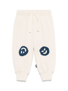 Pantaloni sportivi per neonato Molo Simeon beige con motivo smiley 6S25I206 8894 MOLO 