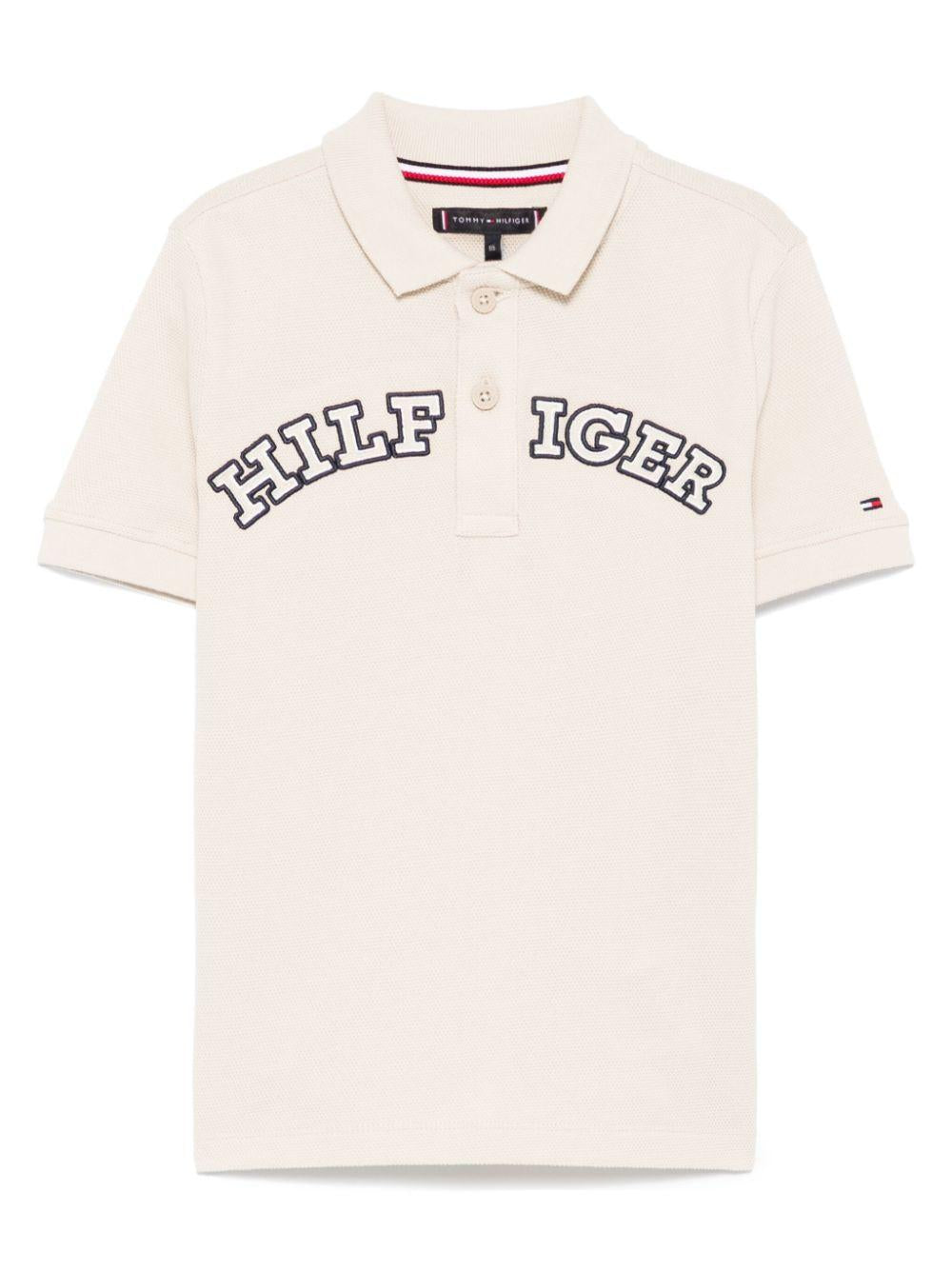 Polo Monotype per bambino Tommy Hilfiger Junior beige con logo sulla manica KB0KB09391 ACI TOMMY HILFIGER JUNIOR 