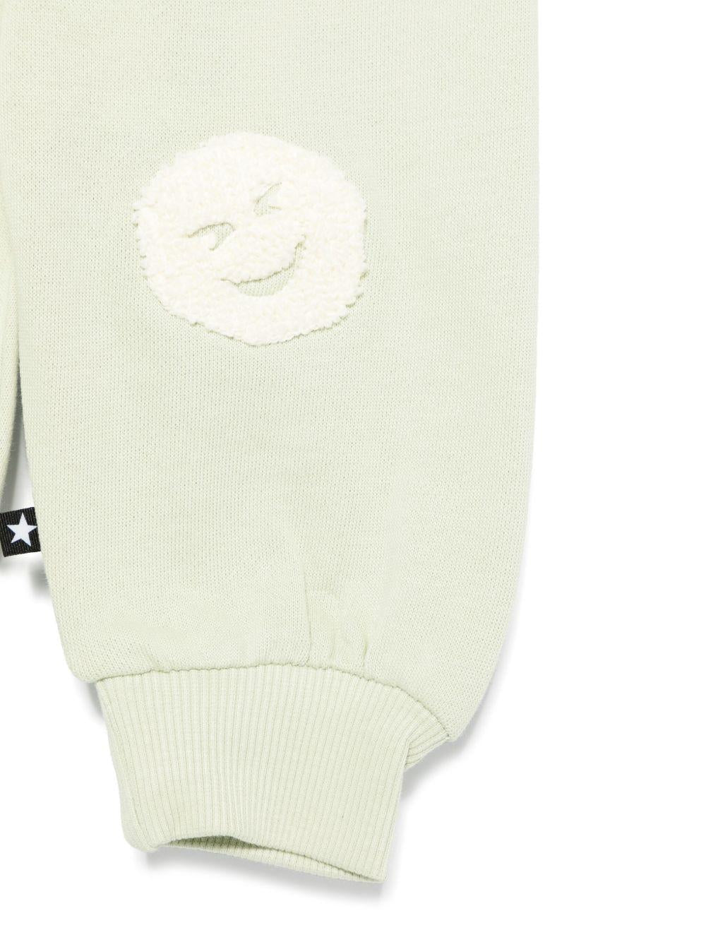 Pantaloni per neonato Molo Simeon verde con motivo smiley 6S25I206 5406 MOLO 