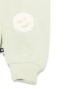 Pantaloni per neonato Molo Simeon verde con motivo smiley 6S25I206 5406 MOLO 